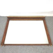 A burr walnut and parcel gilt overmantel mirror, 20th century, with a dentil moulded cornice, 132