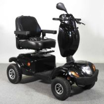 A black Freerider electric mobility scooter, with charger Overall working and usable. Does have some