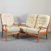 A Cintique cream upholstered two seater sofa, together with a matching armchair (2) 115w x 85d x 88h
