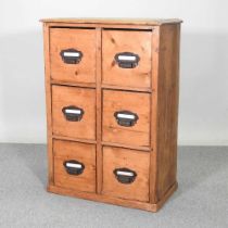 A 19th century continental pine shop cabinet, containing two rows of short drawers 72w x 42d x 73h