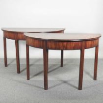 A pair of George III mahogany half-round side tables, on square moulded legs (2) 117w x 58d x 74h