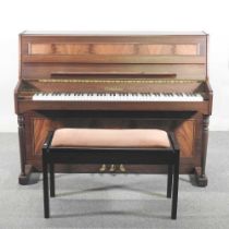 A modern Woodchester Piano Company teak cased upright piano, together with a duet stool (2) 143w x