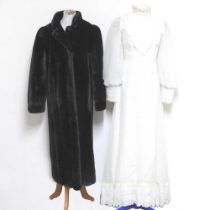 An Astraka 1980's faux fur full length coat, designed by Anne Tyrrell, size 10, together with an