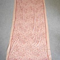 A paisley shawl, 230 x 100cm Overall condition looks to be clean and undamaged, with some light