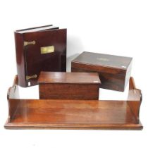 An early 20th century mahogany bookslide, 63cm wide, together with a Victorian rosewood writing