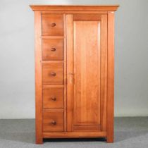 A modern pine single wardrobe, with drawers to one side 101w x 51d x 160h cm