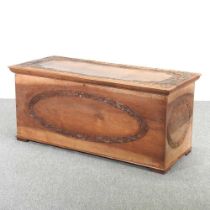 An early 20th century continental carved camphorwood blanket box, with a hinged lid 120w x 51d x 53h