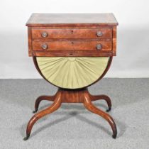 A 19th century mahogany and crossbanded work table, on a downswept quadruped base 55w x 40d x 74h