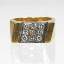 An 18 carat gold nine stone pave set diamond ring, 14g, size P