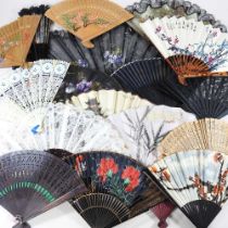 A collection of 20th century painted and carved fans