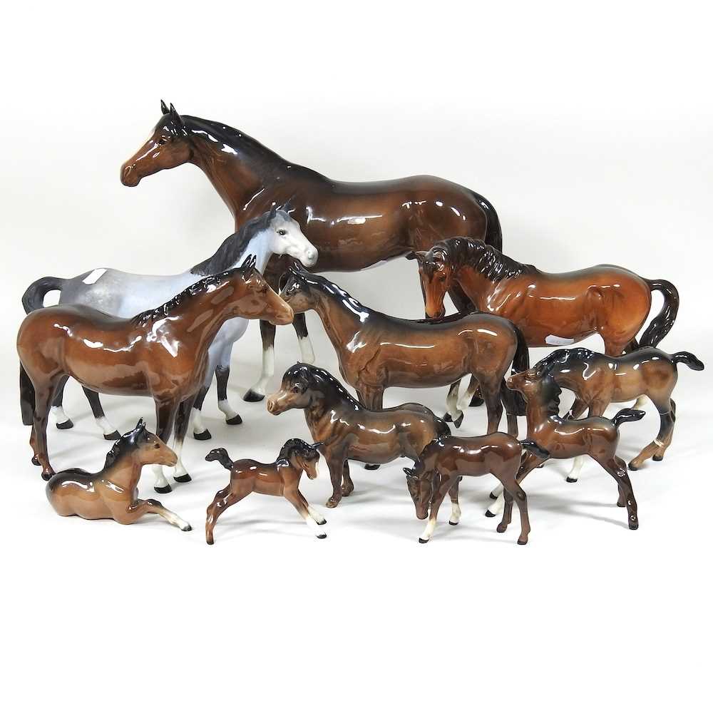A large Beswick model of a horse, 29cm high, together with a collection of Beswick and other model