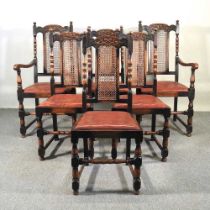 A set of six early 20th century oak dining chairs, with cane backs, to include two carvers (6)