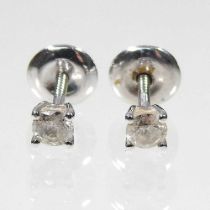 A pair of 18 carat white gold diamond stud earrings, each approximately 0.2 carats, 1.2g, cased