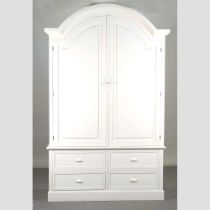 A white painted armoire, fitted with shelves, with drawers below 134w x 55d x 219h cm Overall