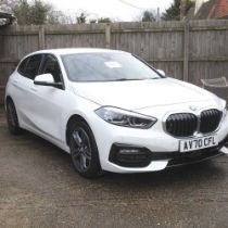 **A white BMW 1 Series hatchback, 118i sport, 1499cc, 16,800 miles showing, first registered 09/09/