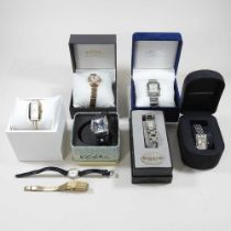 An Emporio Armani ladies dress watch, boxed, together with a collection of various ladies dress