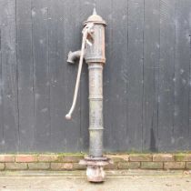 A large antique cast iron water pump, 160cm high