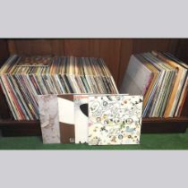 A collection of approximately two-hundred vinyl records, mainly circa 1970's and 1980's rock and pop