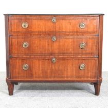 A 19th century continental inlaid chest, containing three drawers, on tapered feet 100w x 51d x