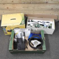 A toy radio controlled helicopter, boxed, together with a Lotus Wheel controller, boxed (2)