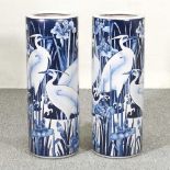 A pair of Chinese pottery stick stands, 60cm high (2)