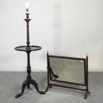 An early 20th century mahogany standard lamp, 120cm high, together with a 19th century swing frame