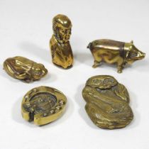 A brass novelty vesta case, modelled as the bust of Gladstone, together with four others various (