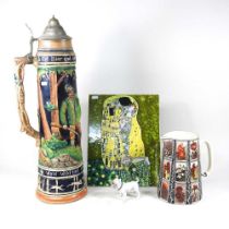 An unusually large German stein, 61cm high, together with a Benaya tile of a Klimt, jug and Royal