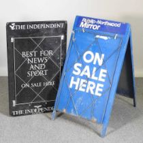 A folding metal newspaper advertising A board, together with another for The Independent, 53 x