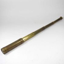 A brass five draw telescope, 71cm long Opens ok, some chips to the glass and dirty