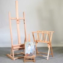 A wooden artist's easel, 172cm high, together with another smaller and a folio stand (3)