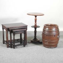 A 19th century salt glazed stoneware barrel, 50cm high, together with an oak nest of occasional