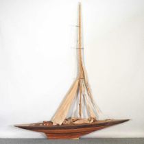 An unusually large wooden model yacht, with sails and rigging 196 x 228cm