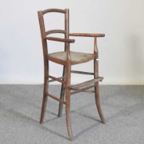 An early 20th century child's bentwood high chair
