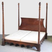 A modern And So To Bed four poster Super King sized Venetian bed, with spirally turned columns and a