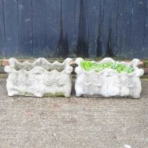 A pair of cast stone garden troughs, with relief decoration (2) 65w x 35d x 31h cm