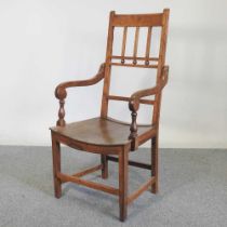 A 19th century fruitwood Mendlesham style high back open armchair