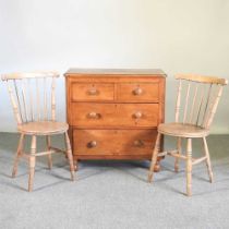 A 19th century pine chest, together with a pair of spindle back dining chairs (3) 83w x 42d x 82h