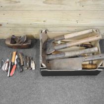 A collection of vintage hand tools, together with pruning and folding pocket knives