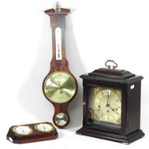 A modern bracket clock, 32cm high, together with a barometer and a desk set (3)