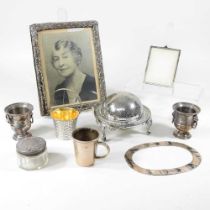 An early 20th century silver photograph frame, with a moulded surround, 24 x 18cm, together with a