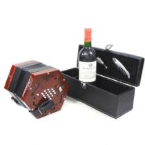 A Rossini concertina, cased, together with a bottle of Bordeaux 1998 red wine, boxed (2)