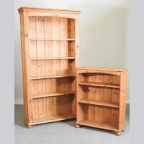 A pine standing open bookcase, together with a smaller dwarf open bookcase (2) 97w x 28d x 185h cm