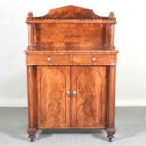 A Regency mahogany chiffonier, with a shaped gallery back, flanked by columns 99w x 44d x 139h cm