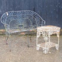 A wirework garden seat, together with a similar metal tray top garden table (2) 102w x 44d x 86h cm