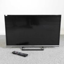 A Panasonic thirty-two inch television, with remote control
