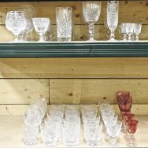 A collection of cut glass, to include tumblers, coloured glass and Stuart crystal