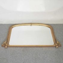 A Victorian style gilt framed over mantel mirror, of arched shape, 113 x 69cm