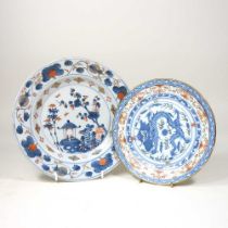 An 19th century Imari porcelain plate, decorated with a dragon, 21cm diameter, together with another