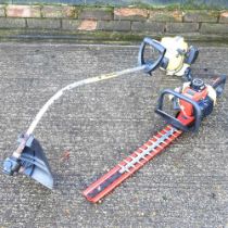 A petrol hedge cutter, together with a petrol strimmer (2)